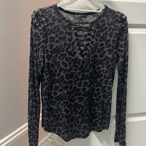 Black and grey cheetah print long sleeve top.